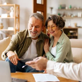 older couple learning about mortgages from a mortgage advisor